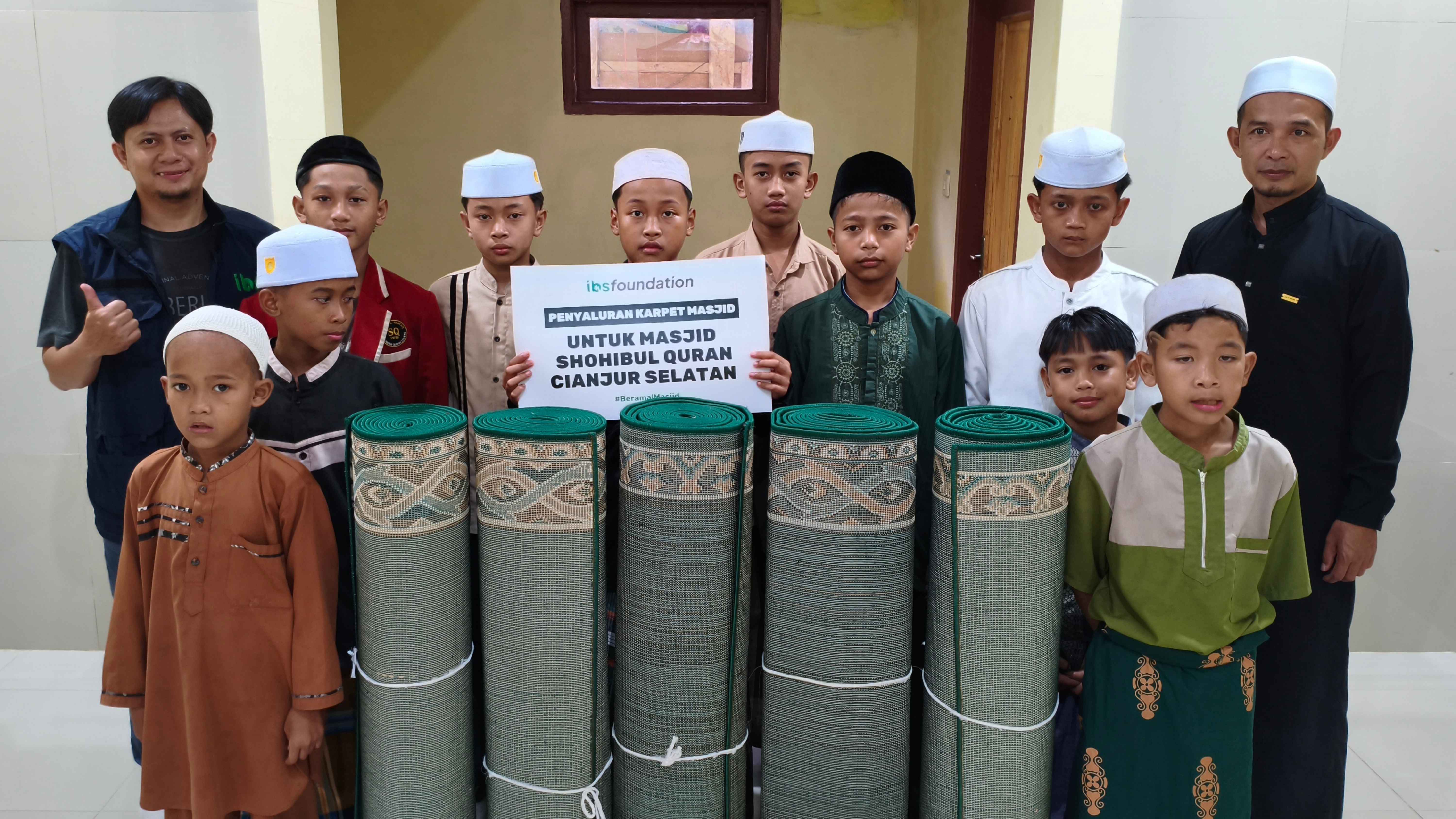 Indonesian student smiling with a book